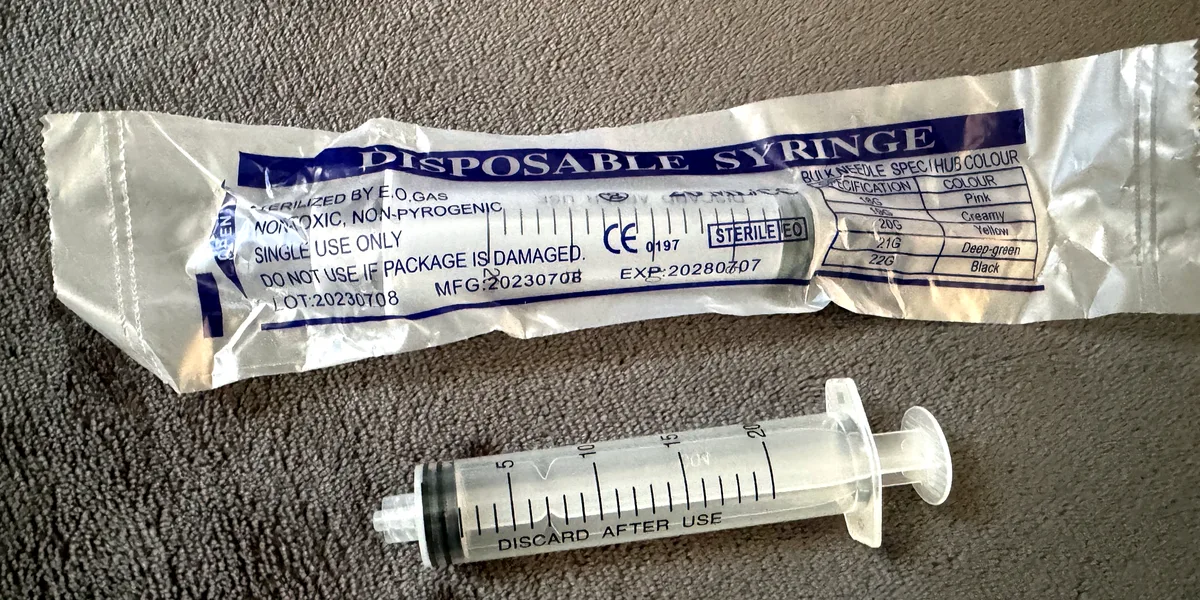 Disposable Luer-lock syringes (individually wrapped, sterile), photographed by SB Mycology